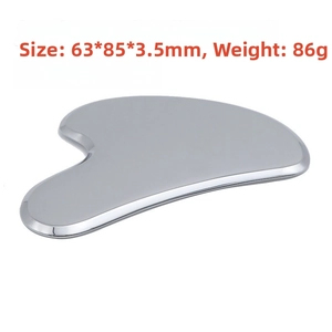 Polished heart-shaped stainless steel Gua Sha tool showing 85x63mm size dimensions