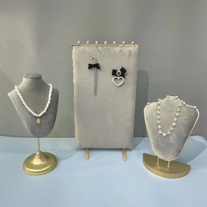 Gray velvet jewelry display stand set with gold base for necklaces and earrings