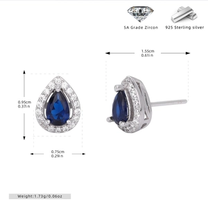 Detailed view of pear-shaped blue gemstone earrings with 925 silver and cubic zirconia studs