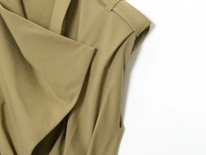 Detail of khaki twill fabric showing lapel structure and shoulder pad design