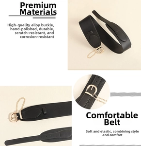 Close-up of black wide waist belt with gold horseshoe buckle and metal chain details