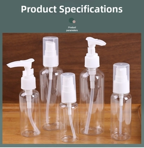 Detail view of transparent PET travel bottles with pump and spray heads on wooden base