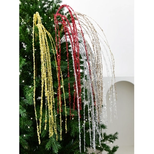 Sparkly 90cm Christmas glitter spray branches hanging on a festive green tree