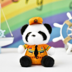 Close-up van een schattige panda knuffel gekleed in een oranje reddingswerker uniform.