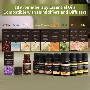 Detail view of 10ml essential oil bottles in dark glass with labeled packaging boxes