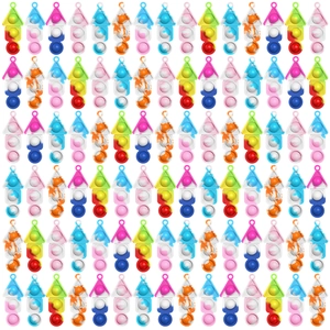 Close-up of silicone pop it fidget toys in colorful rainbow and marble patterns