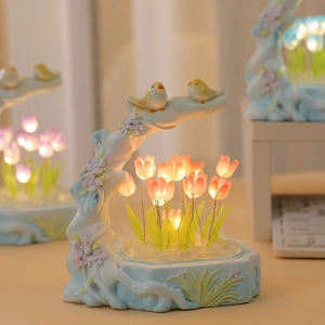 DIY bird and tulip night light with warm glow on a wooden base for home decoration