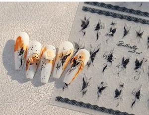 Macro detail of 3D butterfly nail stickers with elegant faux pearl floral accents