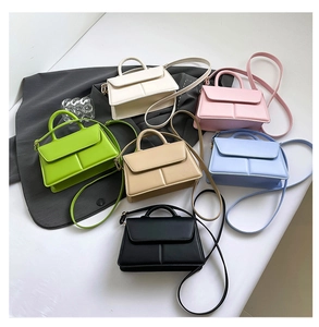 Minimalist PU leather square bags shown in six colors with top handle and shoulder straps