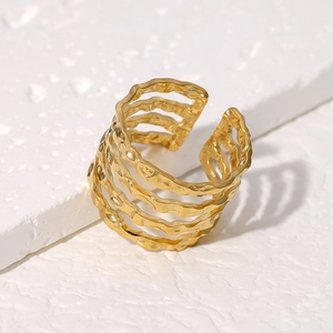 Minimalist gold multi-layer wave ring with irregular hammered texture and open design