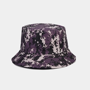 Close-up of digital camouflage pattern on fisherman hat with purple and black pixel texture