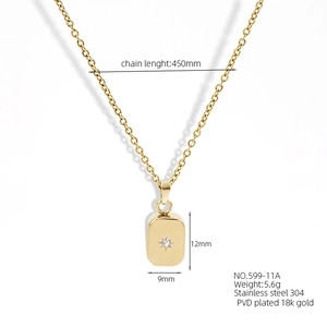 Detail view of gold rectangle pendant with starburst cubic zirconia and dimensions