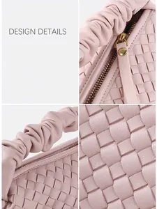 Pink woven leather handbag with ruched handles and elegant pleated texture design