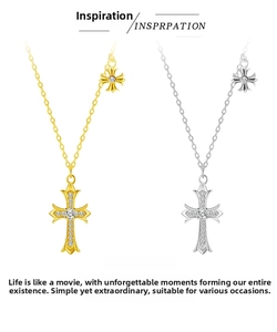Detailed close-up of gothic cross pendant with sparkling stones in gold and silver finish