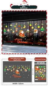 Detailed view of Merry Christmas window stickers showing Santa and penguin decals on glass