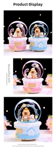 Detail of Capybara crystal ball showing glowing base and cute miniature characters