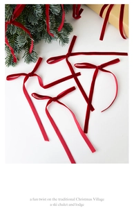 Detail of red velvet handmade bows for Christmas tree decoration and gift wrapping