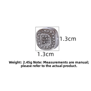Macro view of 1.3cm silver square bead with paved zircons and product measurements