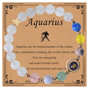 Aquarius beaded bracelet with blue goldstone and gold star charm on gift card