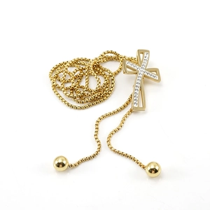 Long 18K gold-plated titanium steel sweater necklace featuring a diamond-set cross pendant