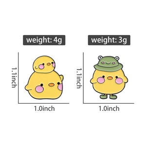 Detail view of cartoon duck enamel pins with dimensions and weight measurements