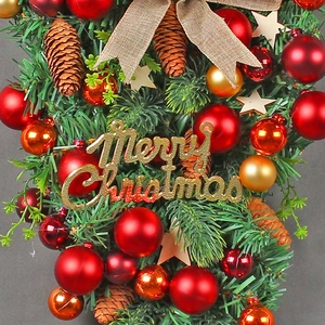 Christmas hanging wreath with red ornaments, burlap bow and Merry Christmas gold sign