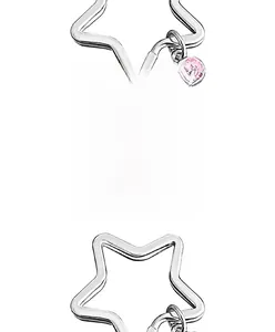 Macro detail of stainless steel heart ring with pink gem and engraved Mother's Day message