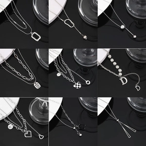 Detailed grid showing nine styles of silver titanium steel Cuban and multilayer necklaces