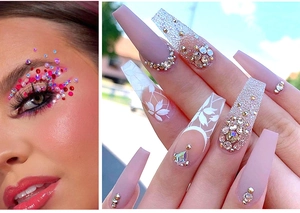 Close-up of colorful nail art rhinestones and crystal eye makeup decorations for DIY