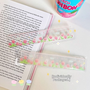 Detailed view of a 15cm transparent ruler featuring cute rabbit and tulip patterns