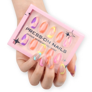 Short almond press-on nails with colorful macaroon streamline design in pink packaging