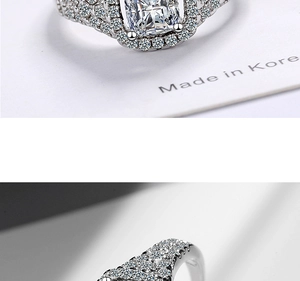 Macro detail of luxury cushion cut cubic zirconia ring with micro-pave setting