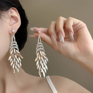 Elegant rhinestone drop earrings with champagne crystal tassels in vintage court style