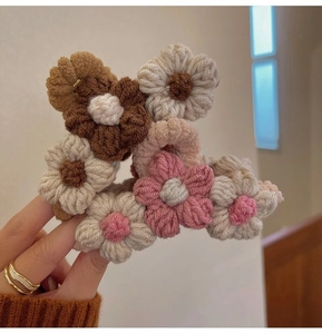 Knitted flower shark hair clip with colorful handmade crochet blossoms for women