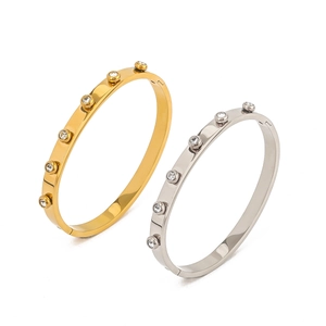 Minimalist 18K gold and silver plated bangles with six bezel-set round zircon crystals