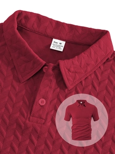 Close-up of dark red men's Polo shirt showing V-shape textured fabric and size label