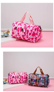 Detail of pink leopard and graffiti gym bags featuring front pockets and reinforced handles