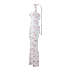Detail of white maxi dress with pink rose print, halter neck ties and slim fit design