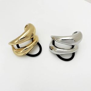 Minimalist geometric ponytail hair ties in gold and silver finish with metal rings