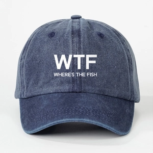 Detailed close-up of washed blue denim baseball cap featuring white WTF FISH print