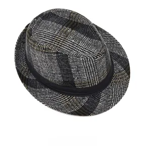 Detail of grey plaid fedora hat with a wide black grosgrain ribbon for men