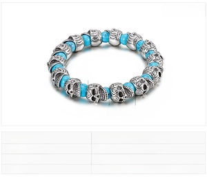 Detail of vintage skull bracelet showing 8mm turquoise beads and steel skull casting