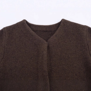 Women's dark brown knit cardigan with faux fur texture and matching button detail
