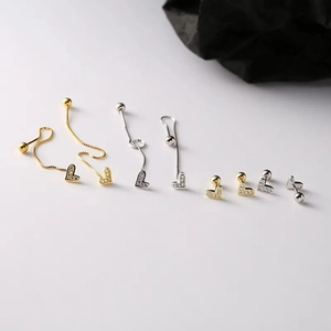 Asymmetric heart screw stud earrings and long chain ear threads with sparkling crystals