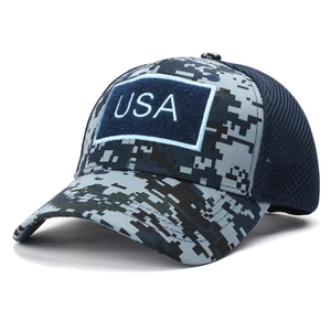 Detailed view of tactical digital camouflage mesh cap with blue USA embroidery patch