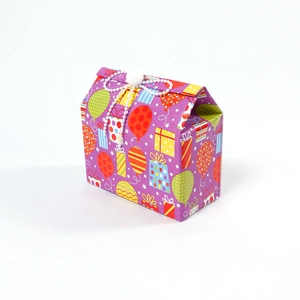 Purple birthday gift box with balloon patterns and a decorative white pearl ribbon bow