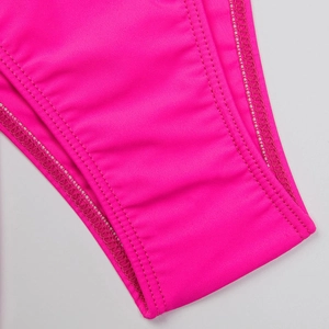 Detailed close-up of bright pink swimwear featuring high-quality double-needle stitching work