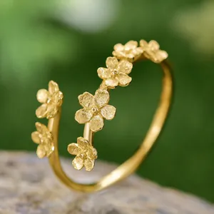S925 sterling silver gold-plated open ring with matte floral forget-me-not design