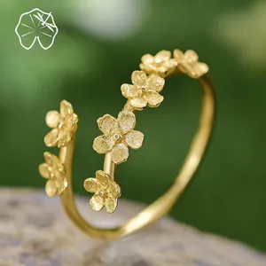 S925 sterling silver gold-plated open ring with matte floral forget-me-not design