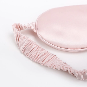 Pink 22 momme mulberry silk sleep mask with smooth elastic band and luxury satin texture